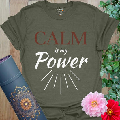 Heather Military Green tee with bold “Calm is my Power” affirmation in white and brown lettering. Graphic radiating calm energy for mindful strength.