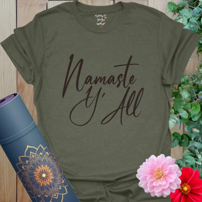 Heather Military Green tee with bold handwritten script reading “Namaste Y’All.” A calm and grounded yoga shirt with Southern charm.