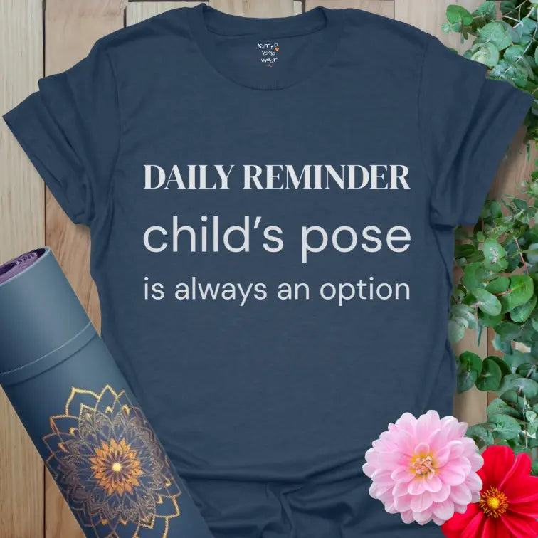 Heather Navy Childs Pose T-Shirt with crisp white text stating “child’s pose is always an option” for everyday calm.
