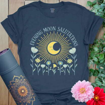 Heather Navy Evening Moon Salutations T-Shirt showcasing soft golden rays and moonlight blooms. Yoga tee celebrating balance and nighttime calm.