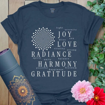 Navy yoga tee with gratitude-inspired word art design and mandala-style sunburst.