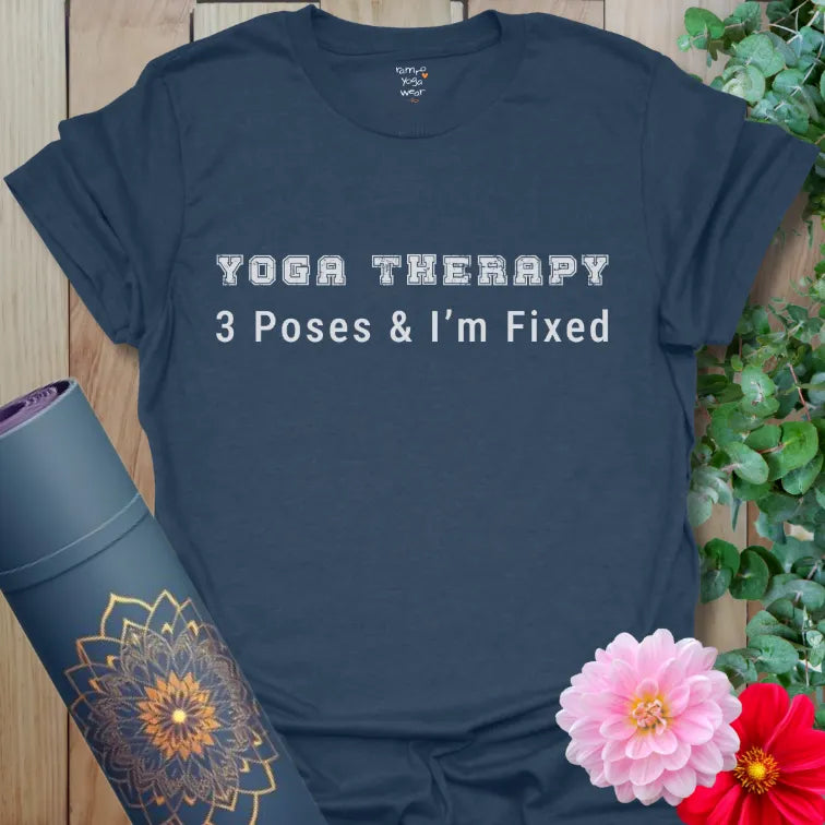 Heather Navy Three Poses T-Shirt with vintage-style “Yoga Therapy” headline and “3 Poses & I’m Fixed.” Bold yoga humor tee for yogis.