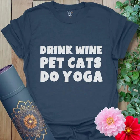 Heather Navy Wine and Cats T-Shirt featuring playful “Drink Wine, Pet Cats, Do Yoga” print. Relaxed fit for everyday wear.