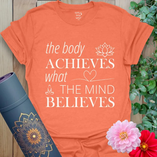 Heather Orange Achieve T-Shirt featuring empowering text and serene yoga icons. Warm tones with a vibrant, goal-oriented vibe.