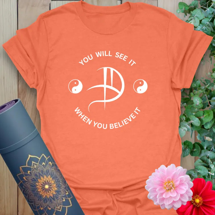Heather orange Believe It T-Shirt with inspiring affirmation and mindful energy