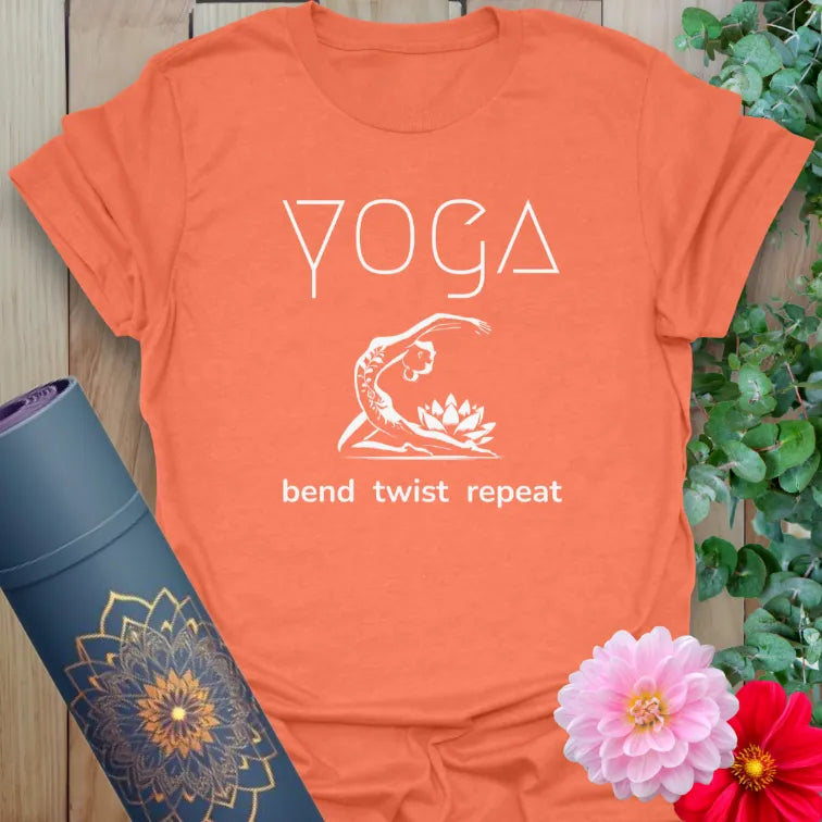 Heather orange yoga tee with curved pose and mindful flow statement