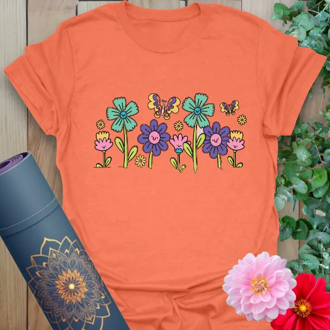 Heather orange nature t-shirt with vibrant boho flowers and butterflies