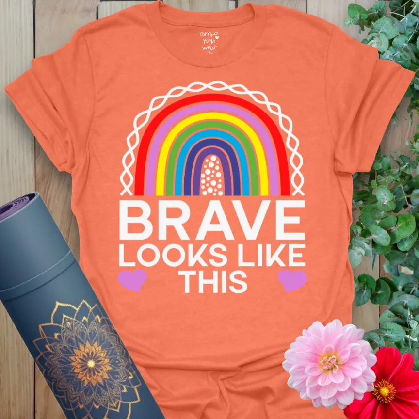 Heather orange t-shirt featuring vibrant rainbow and Brave Looks Like This quote