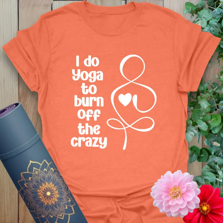 Heather orange yoga t-shirt with “I do yoga to burn off the crazy” print