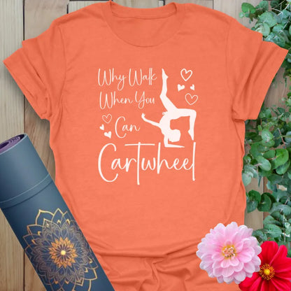 Heather orange yoga shirt with inspirational cartwheel quote and heart details