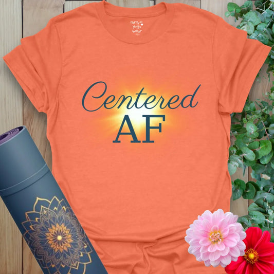 Heather Orange Centered AF T-Shirt with radiant center glow and bold script. A soft yoga tee that mixes humor with grounded energy.