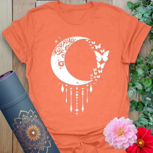 Heather orange t-shirt with mystical crescent moon and butterfly transformation imagery