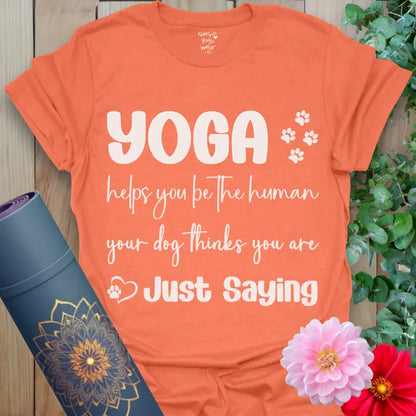 Heather Orange Dogs Think T-Shirt with yoga quote and paw print design. Bright, fun yoga tee for dog parents.