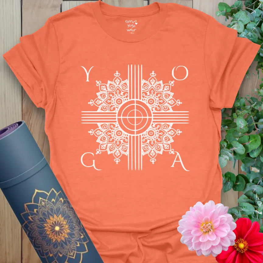 Vibrant orange yoga t-shirt featuring intricate mandala design for mindful balance and spiritual flow.