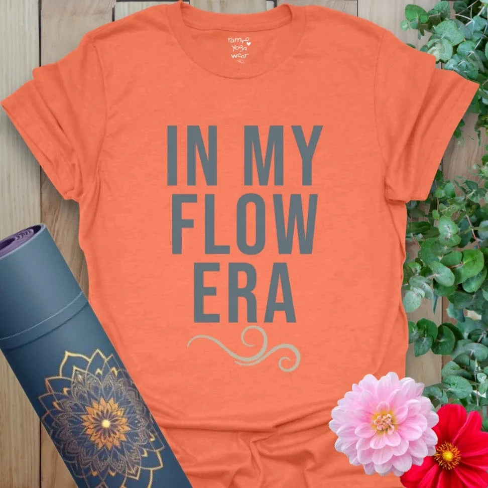 Heather Orange Era T-Shirt with bold contrast text and flow era theme. Confident and breathable lifestyle tee.