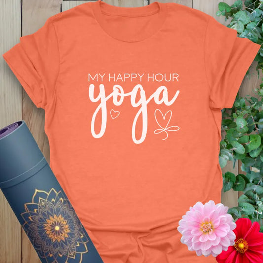 Vibrant orange yoga t-shirt showcasing happy hour yoga quote inspiring conscious, cheerful living.