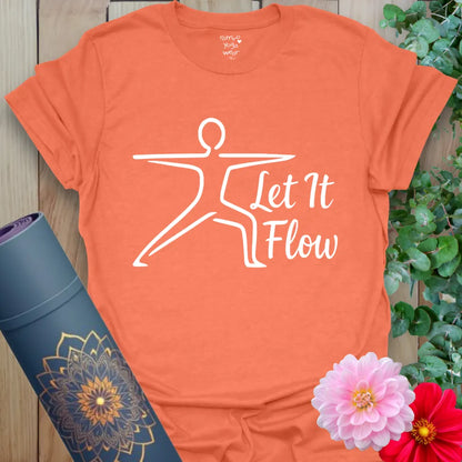 Vibrant orange yoga t-shirt showcasing clean warrior silhouette and empowering flow message for soulful movement.