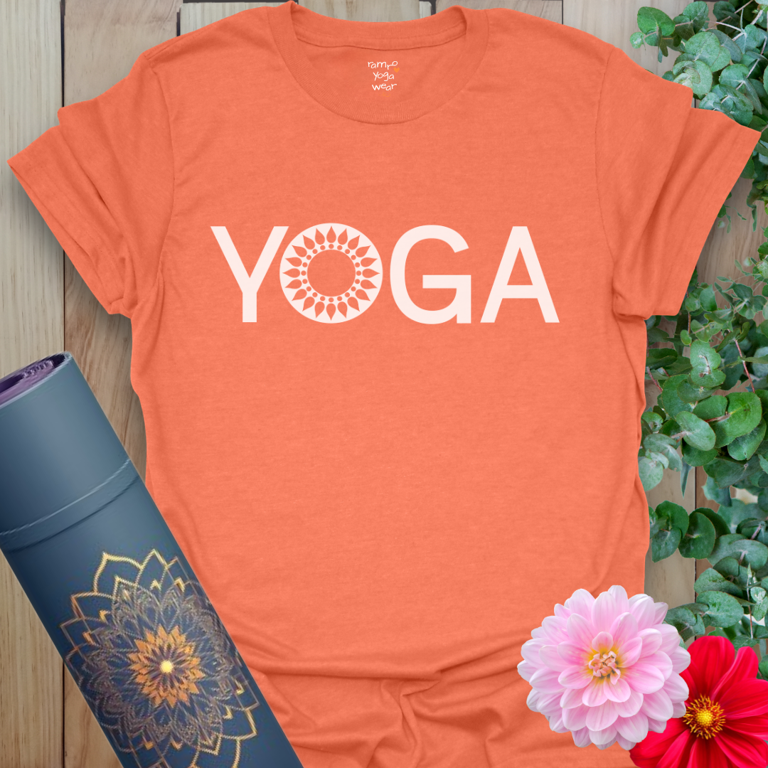 Vibrant orange yoga t-shirt featuring clean typography and sun mandala for spiritual focus.