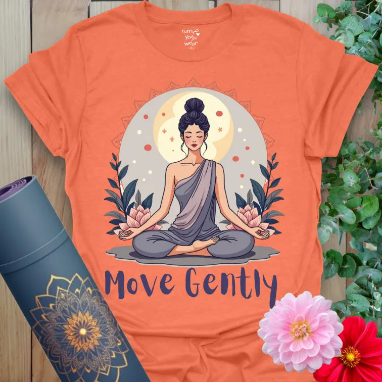 Vibrant orange yoga t-shirt showcasing peaceful meditation figure and mindful movement quote for heart-centered, conscious presence.