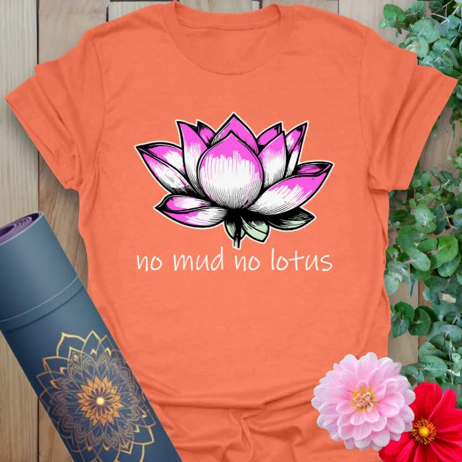 Vibrant orange yoga t-shirt showcasing inspirational lotus design and soulful growth message for conscious, heart-centered living.