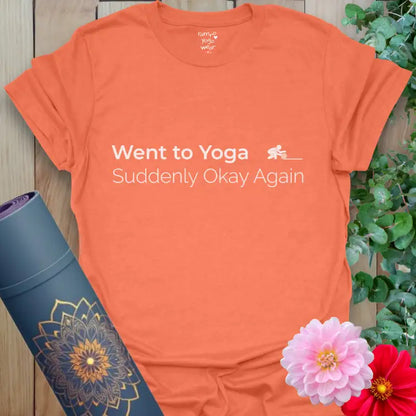 Heather Orange Okay Again T-Shirt with crisp white text design. Cheerful yoga tee that captures the instant calm of your favorite class.