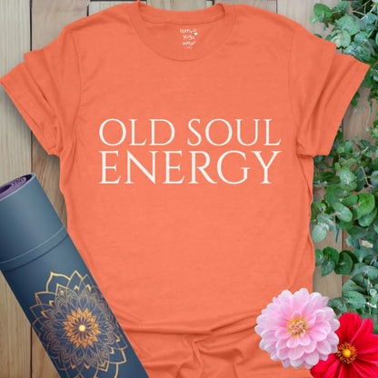 Bright orange cotton tee with minimalist old soul affirmation, perfect for bold energy and timeless style.