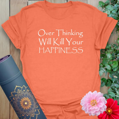 Vibrant orange yoga t-shirt showcasing powerful mindful living mantra to inspire positivity and self-care.