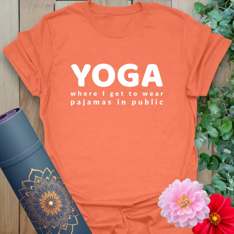 Vibrant orange yoga t-shirt showcasing fun, bold pajama quote blending yoga love with laid-back lifestyle humor.