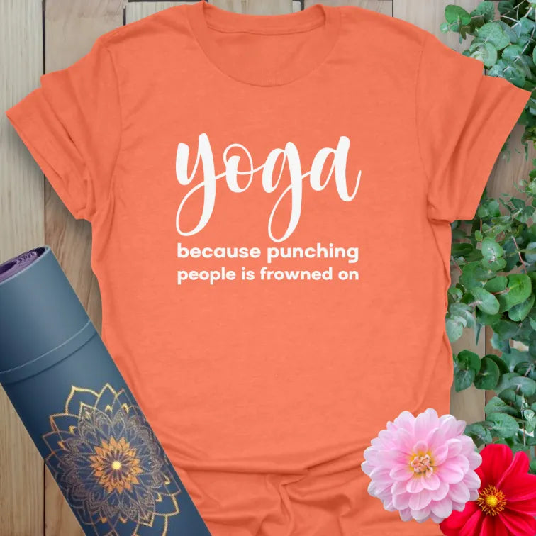 Vibrant orange yoga t-shirt showcasing cheeky yoga humor design inspiring playful mindfulness and conscious calm.