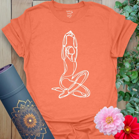 Vibrant orange yoga t-shirt showcasing graceful meditative goddess figure inspiring conscious movement and soulful strength.