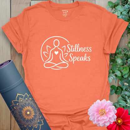 Vibrant orange t-shirt with serene minimalist line art and meditation message for conscious, peaceful movement.
