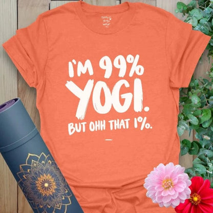 Vibrant orange t-shirt with cheeky yoga quote in bold lettering, perfect for mindful humor and movement.