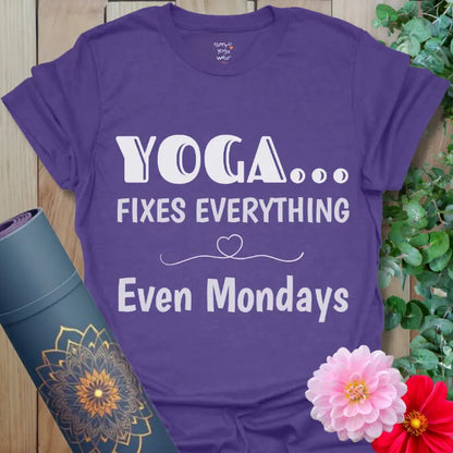 Heather Purple Fixes Everything T-Shirt featuring playful yoga text and heart flourish. Yoga lifestyle shirt for shifting Monday energy.