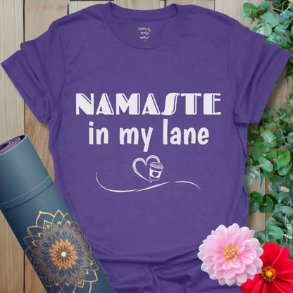 Heather Purple Lane T-Shirt featuring “Namaste in my lane” mantra and coffee-heart flourish, soft cotton tee for yoga lovers.