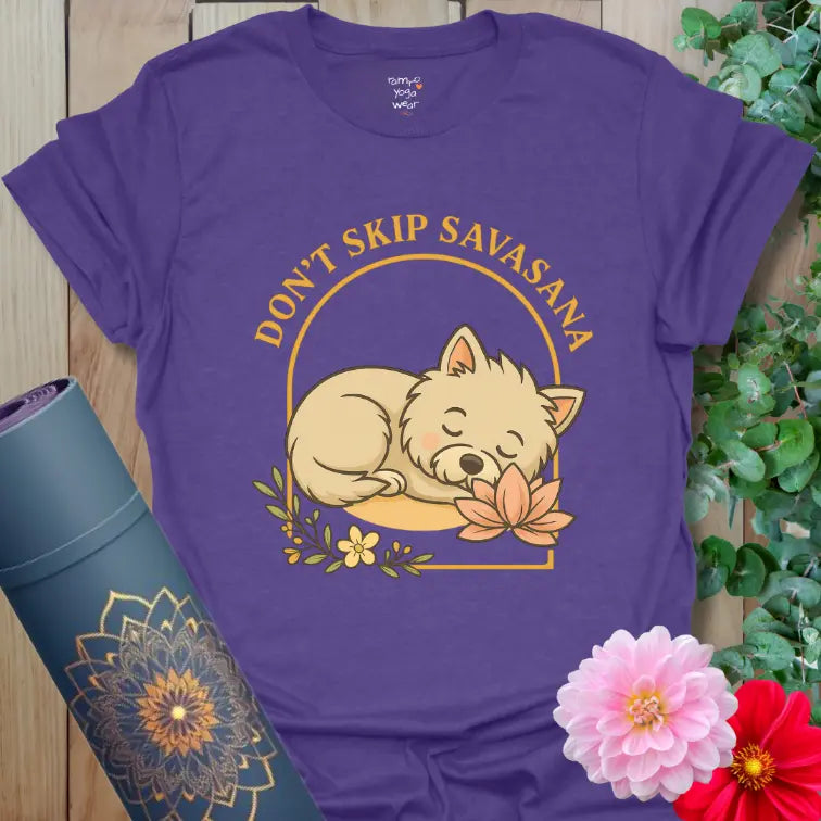 Heather Purple Sleeping Westie T-Shirt with calm dog + lotus artwork. Cosy yoga tee reminding you not to skip Savasana.
