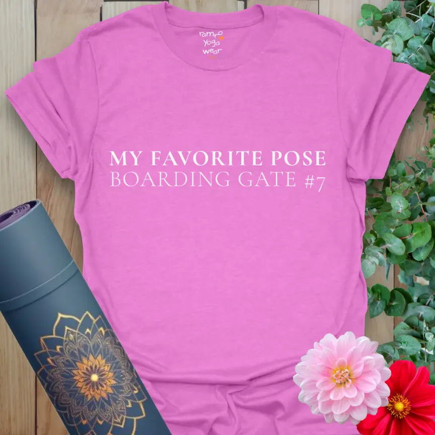 Heather Radiant Orchid Boarding Gate T-Shirt with clean white lettering: “My Favorite Pose — Boarding Gate #7.” Fun yoga travel tee for wanderlust lovers.