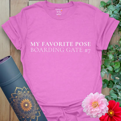 Heather Radiant Orchid Boarding Gate T-Shirt with clean white lettering: “My Favorite Pose — Boarding Gate #7.” Fun yoga travel tee for wanderlust lovers.
