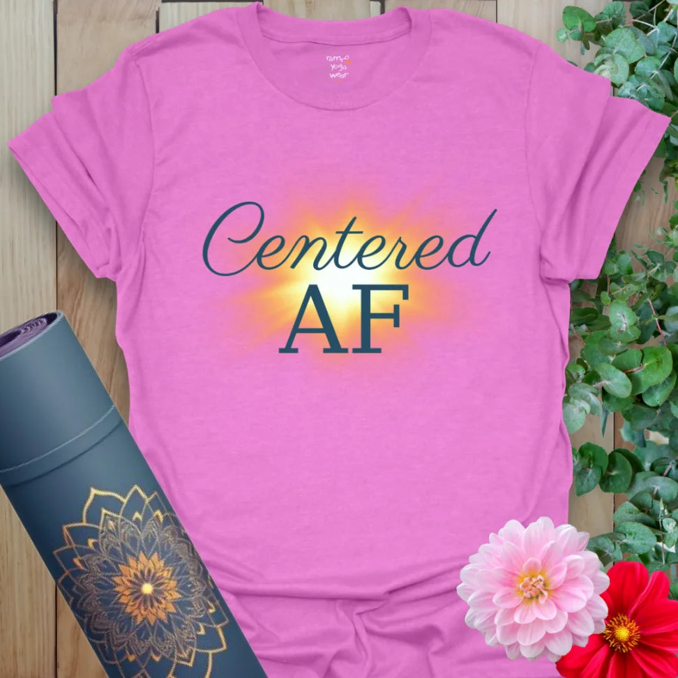 Centered AF T-Shirt in Heather Radiant Orchid with glowing core and elegant text. A playful yet powerful yoga lifestyle shirt