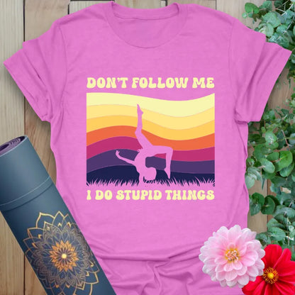 Purple Don't Follow T-Shirt with bold sunset colors and handstand silhouette