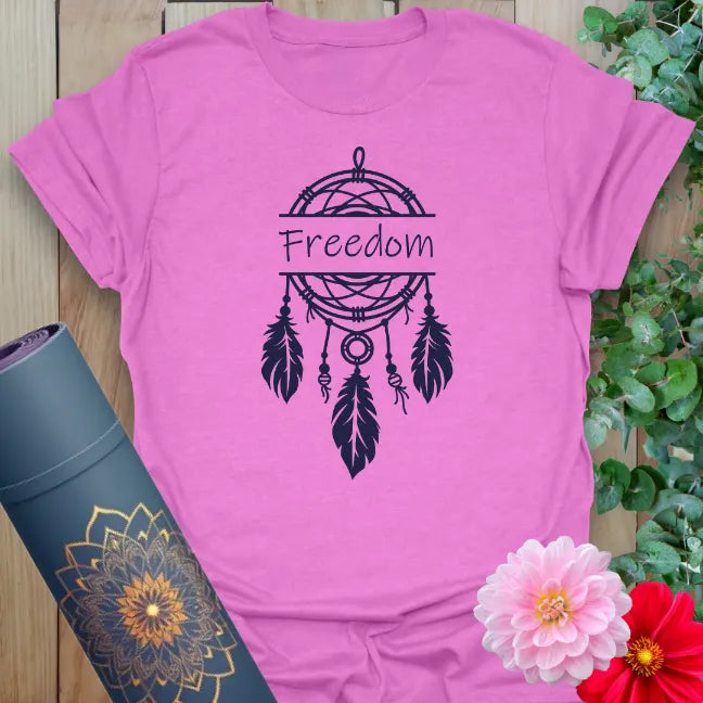 Radiant orchid-colored yoga tee with dreamcatcher and "Freedom" message for spiritual seekers and free spirits.