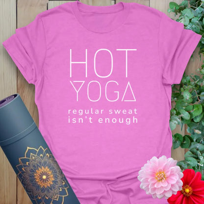 Radiant orchid-colored yoga tee with bold hot yoga graphic celebrating fiery, soulful practice.