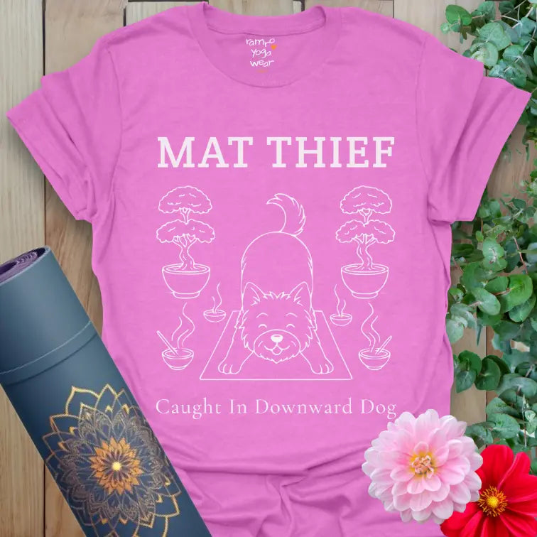 Heather Radiant Orchid Mat Thief T-Shirt with a cute pup doing Downward Dog; light, humorous yoga tee with clean line art.