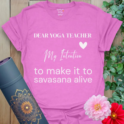 Heather Radiant Orchid My Intention T-Shirt featuring a bright pop of color, flowing script, and witty savasana message. Playful yoga tee with heart icon.