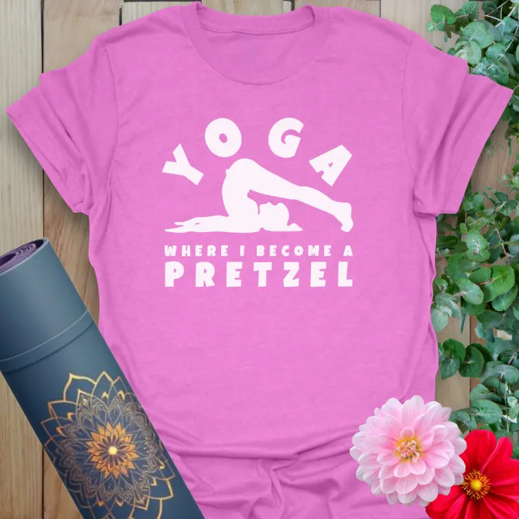 Radiant orchid-colored yoga tee with humorous pretzel-inspired yoga design celebrating playful mindful living.