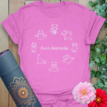 Radiant orchid-colored yoga tee with sweet cat poses and playful "Purr Namaste" message celebrating soulful living.