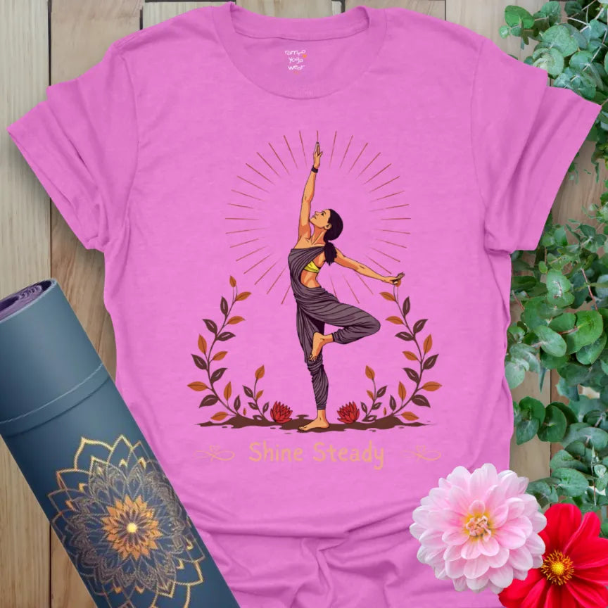 Radiant orchid-colored yoga tee with centered yogi and sun rays design encouraging mindful poise and soulful presence.