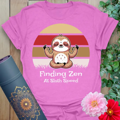 Radiant orchid-colored yoga tee with playful sloth zen design celebrating mindful relaxation and peaceful soul flow.