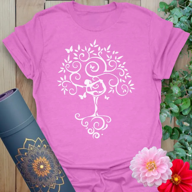 Radiant orchid-colored yoga t-shirt showcasing yogi in Tree Pose becoming a blooming tree, with butterflies.
