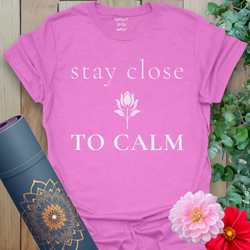 Heather Radiant Orchid Stay Close T-Shirt with a mindful, grounding message designed for softness and everyday comfort.