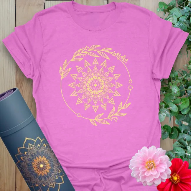Radiant orchid-colored tee showcasing gold sacred geometry sun and leafy circle for divine feminine energy.